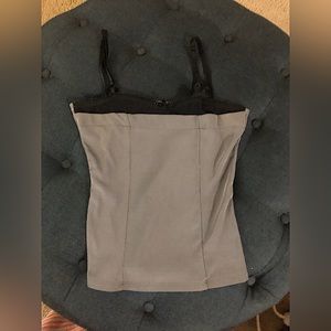 Fitted camisole. Very flattering with adjustable straps